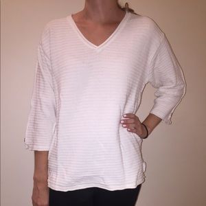 White sweater with cute button detail